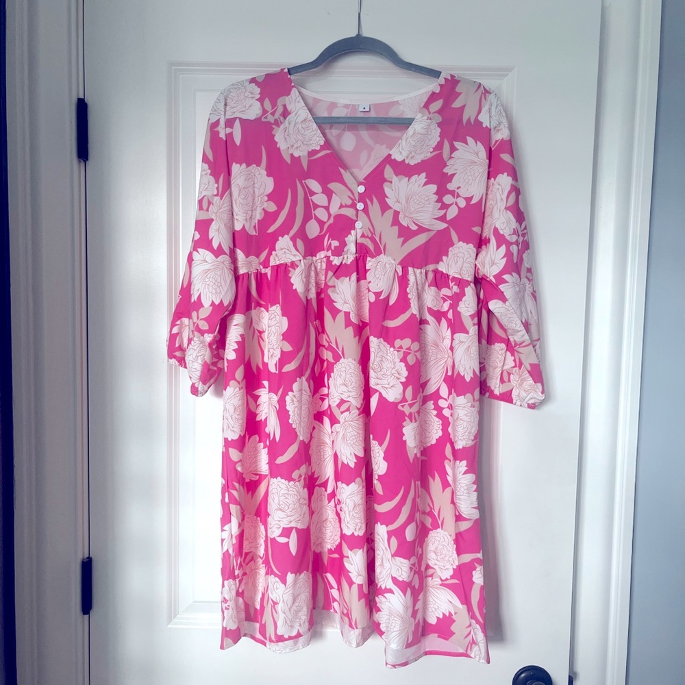 Cute pink flowy floral dress. 3/4 sleeves, empire waist